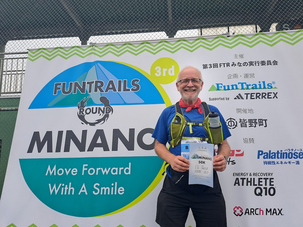 Ray at the finish with certificate