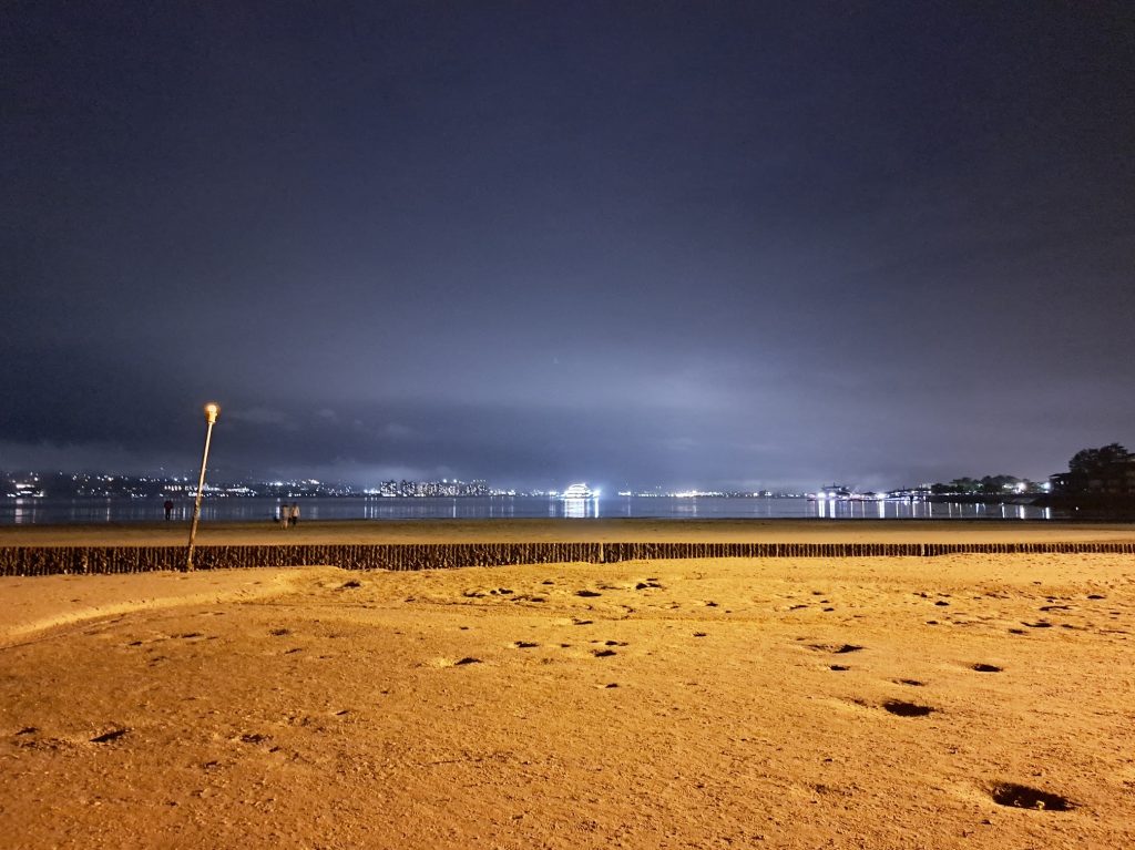 Miyajima beach at night, with the sea out